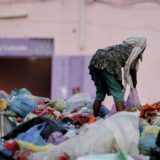 A girl searches through the waste for recyclable plastic and metal materials that can be sold | Taiz Governorate | Visualization: Hamza Al-Jubaihi